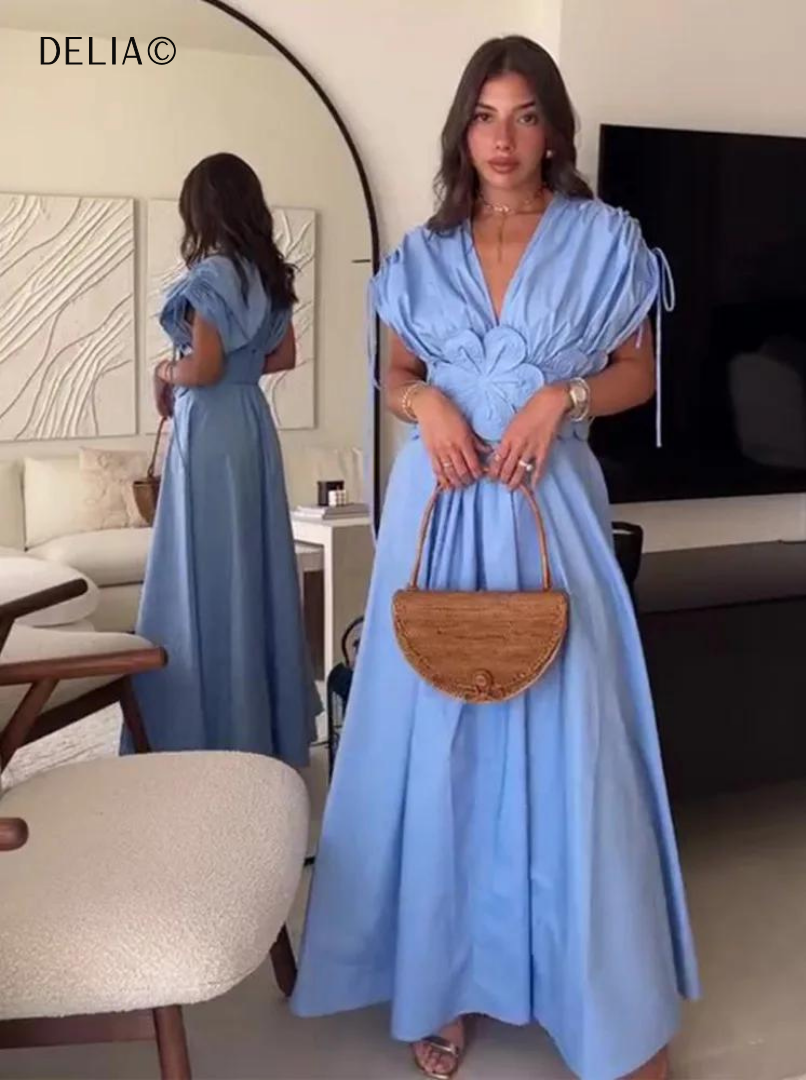 Gracieuse robe longue plissée à taille haute