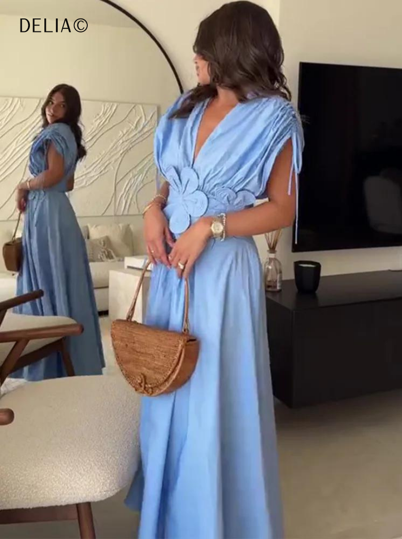 Gracieuse robe longue plissée à taille haute